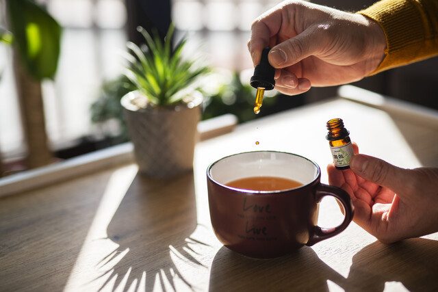 Homeopathic drops in warm morning light